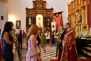 DSC 8331 - Entrada del estandarte y ofrenda floral al Santo Cristo de la Luz en Dalías