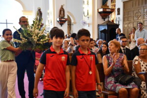 DSC 8402 - Entrada del estandarte y ofrenda floral al Santo Cristo de la Luz en Dalías